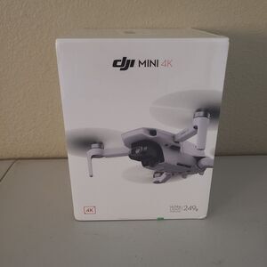 new in box DJI mini 4K drone lightweight photos videos vlogging
